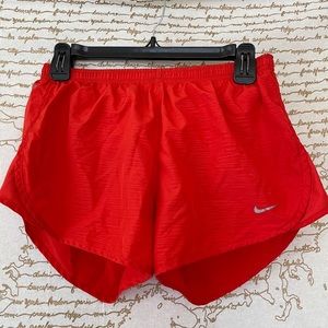 Bright red Nike shorts